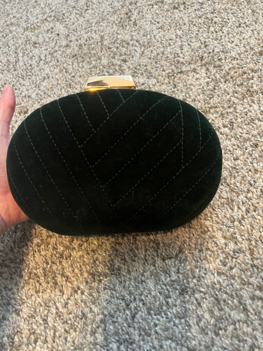 Elegant Dark Green Velvet Oval Clutch with Gold Accent